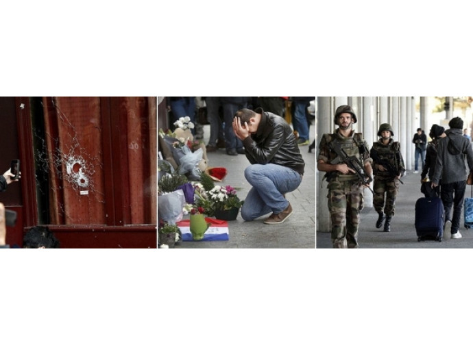 Il locale a Parigi assaltato dai terroristi, i fiori dopo la strage, l'esercito nelle strade Il locale a Parigi assaltato dai terroristi, i fiori dopo la strage, l'esercito nelle strade